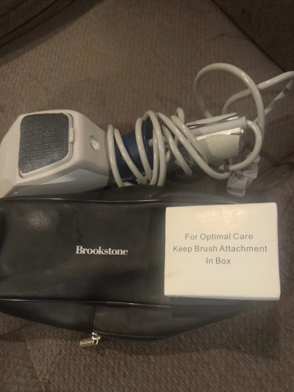 Brookstone White and Blue Handheld Massager with Black Carry Pouch